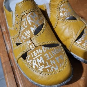 Remonte mules mustard yellow colour